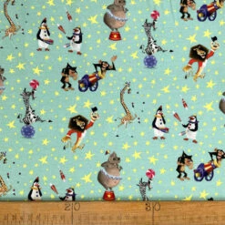 Licensed Jersey - Madagascar Circus -Croft Mill Store cotton elastane jersey fabric licensed madagascar aqua circus print ruler