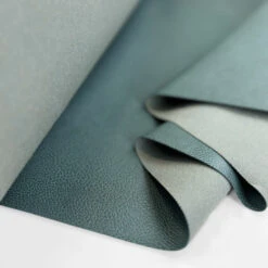 In A While - Teal 7 In A While - Teal -Croft Mill Store faux leather pvc upholstery fabric in a while teal fold