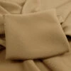 Landon Smooth Crepe - Camel 2 Landon Smooth Crepe - Camel -Croft Mill Store superior satin crepe polyester camel crepe dress fabric fabric close up photo